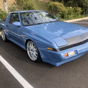 83-89 A180 MITSUBISHI STARION CARBON FIBER HEADER PANEL / NOSE PANEL